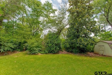 Set on a beautifully landscaped, oversized, 1 plus acre lot on Hide-A-Way Lake Golf Course in Texas - for sale on GolfHomes.com, golf home, golf lot