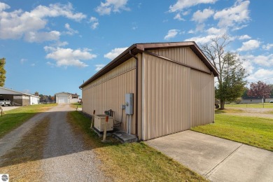 Lakefront home with 2 bedrooms, 3 full bathrooms, and over 2600 on Eagle Glen Golf Course in Michigan - for sale on GolfHomes.com, golf home, golf lot