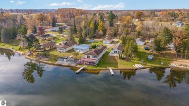 Lakefront home with 2 bedrooms, 3 full bathrooms, and over 2600 on Eagle Glen Golf Course in Michigan - for sale on GolfHomes.com, golf home, golf lot