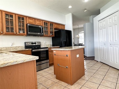 Welcome to this beautifully maintained 3-bedroom, 2-bath home on Stoneybrook West in Florida - for sale on GolfHomes.com, golf home, golf lot