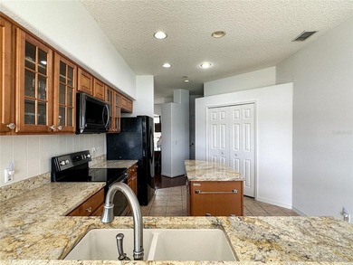 Welcome to this beautifully maintained 3-bedroom, 2-bath home on Stoneybrook West in Florida - for sale on GolfHomes.com, golf home, golf lot