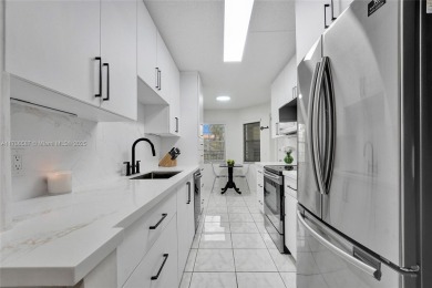 Welcome to this charming condo in Century Village of Pembroke on Flamingo Lakes Country Club in Florida - for sale on GolfHomes.com, golf home, golf lot