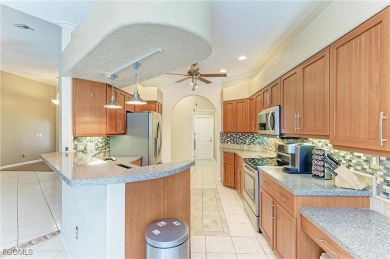 Located in the gated community of Seminole Lakes, home to the on Seminole Lakes Country Club in Florida - for sale on GolfHomes.com, golf home, golf lot