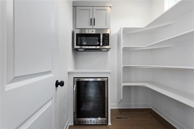 Welcome to *Brookside,* where luxury meets functionality in this on Heritage Park Golf Course in Kansas - for sale on GolfHomes.com, golf home, golf lot