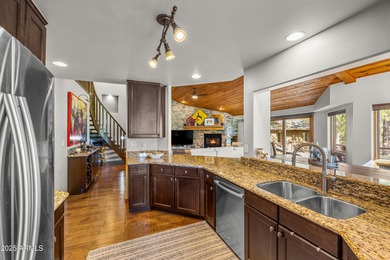 Escape to this pristine and well-cared-for cabin nestled among on Forest Highlands Golf Club - The Canyon in Arizona - for sale on GolfHomes.com, golf home, golf lot