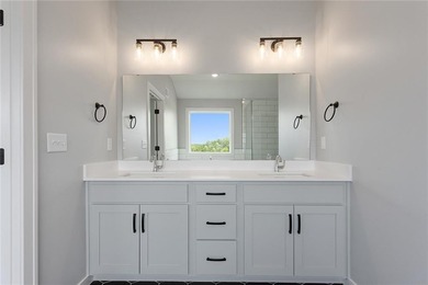 Welcome to *Brookside,* where luxury meets functionality in this on Heritage Park Golf Course in Kansas - for sale on GolfHomes.com, golf home, golf lot