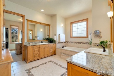 Located in Highland Hills, this exquisite property is nestled on Ptarmigan Golf Course in Colorado - for sale on GolfHomes.com, golf home, golf lot