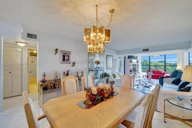 This 2 bedroom 2 bathroom 4th floor condo overlooking the golf on Pine Island Ridge Country Club in Florida - for sale on GolfHomes.com, golf home, golf lot