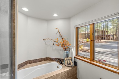 Escape to this pristine and well-cared-for cabin nestled among on Forest Highlands Golf Club - The Canyon in Arizona - for sale on GolfHomes.com, golf home, golf lot