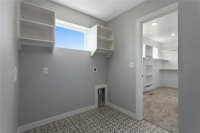 Welcome to *Brookside,* where luxury meets functionality in this on Heritage Park Golf Course in Kansas - for sale on GolfHomes.com, golf home, golf lot