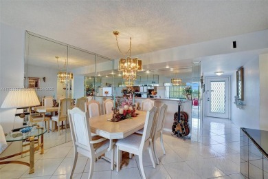 This 2 bedroom 2 bathroom 4th floor condo overlooking the golf on Pine Island Ridge Country Club in Florida - for sale on GolfHomes.com, golf home, golf lot