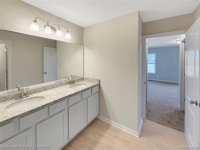 Award winning Clearview Homes is building this single-family on Rolling Hills Golf Club in Michigan - for sale on GolfHomes.com, golf home, golf lot