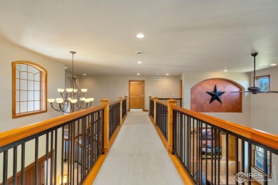 Located in Highland Hills, this exquisite property is nestled on Ptarmigan Golf Course in Colorado - for sale on GolfHomes.com, golf home, golf lot