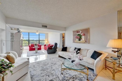 This 2 bedroom 2 bathroom 4th floor condo overlooking the golf on Pine Island Ridge Country Club in Florida - for sale on GolfHomes.com, golf home, golf lot