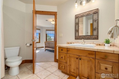 Located in Highland Hills, this exquisite property is nestled on Ptarmigan Golf Course in Colorado - for sale on GolfHomes.com, golf home, golf lot