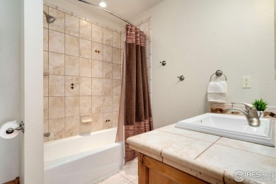 Located in Highland Hills, this exquisite property is nestled on Ptarmigan Golf Course in Colorado - for sale on GolfHomes.com, golf home, golf lot