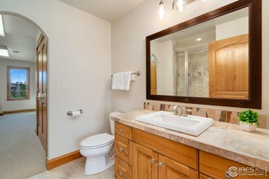 Located in Highland Hills, this exquisite property is nestled on Ptarmigan Golf Course in Colorado - for sale on GolfHomes.com, golf home, golf lot