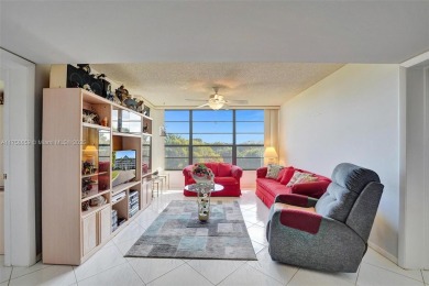 This 2 bedroom 2 bathroom 4th floor condo overlooking the golf on Pine Island Ridge Country Club in Florida - for sale on GolfHomes.com, golf home, golf lot