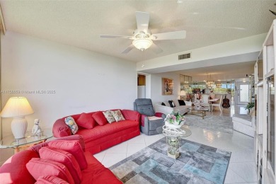 This 2 bedroom 2 bathroom 4th floor condo overlooking the golf on Pine Island Ridge Country Club in Florida - for sale on GolfHomes.com, golf home, golf lot
