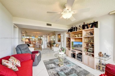 This 2 bedroom 2 bathroom 4th floor condo overlooking the golf on Pine Island Ridge Country Club in Florida - for sale on GolfHomes.com, golf home, golf lot