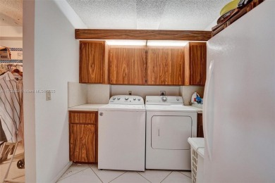 This 2 bedroom 2 bathroom 4th floor condo overlooking the golf on Pine Island Ridge Country Club in Florida - for sale on GolfHomes.com, golf home, golf lot