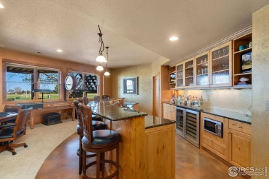 Located in Highland Hills, this exquisite property is nestled on Ptarmigan Golf Course in Colorado - for sale on GolfHomes.com, golf home, golf lot