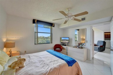 This 2 bedroom 2 bathroom 4th floor condo overlooking the golf on Pine Island Ridge Country Club in Florida - for sale on GolfHomes.com, golf home, golf lot