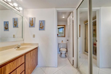 This 2 bedroom 2 bathroom 4th floor condo overlooking the golf on Pine Island Ridge Country Club in Florida - for sale on GolfHomes.com, golf home, golf lot