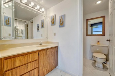 This 2 bedroom 2 bathroom 4th floor condo overlooking the golf on Pine Island Ridge Country Club in Florida - for sale on GolfHomes.com, golf home, golf lot