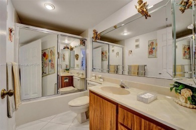 This 2 bedroom 2 bathroom 4th floor condo overlooking the golf on Pine Island Ridge Country Club in Florida - for sale on GolfHomes.com, golf home, golf lot