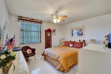 This 2 bedroom 2 bathroom 4th floor condo overlooking the golf on Pine Island Ridge Country Club in Florida - for sale on GolfHomes.com, golf home, golf lot