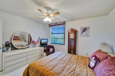 This 2 bedroom 2 bathroom 4th floor condo overlooking the golf on Pine Island Ridge Country Club in Florida - for sale on GolfHomes.com, golf home, golf lot