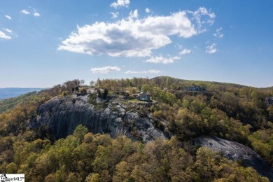 Escape to Your Private Mountain Oasis at 611 Raven. Nestled in on The Cliffs at Glassy Golf and Country Club in South Carolina - for sale on GolfHomes.com, golf home, golf lot