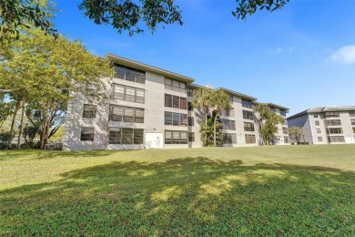 This 2 bedroom 2 bathroom 4th floor condo overlooking the golf on Pine Island Ridge Country Club in Florida - for sale on GolfHomes.com, golf home, golf lot