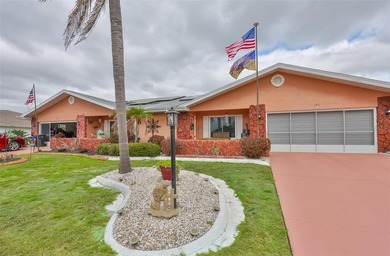 WELCOME TO THIS BEAUTIFULLY UPDATED TWINTREE residence on the on Caloosa Greens Executive Golf Course in Florida - for sale on GolfHomes.com, golf home, golf lot
