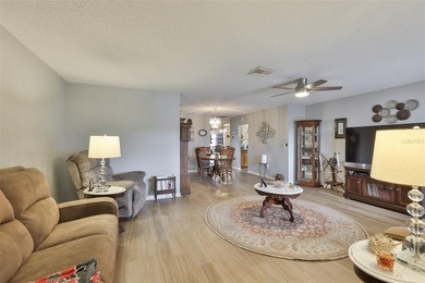 WELCOME TO THIS BEAUTIFULLY UPDATED TWINTREE residence on the on Caloosa Greens Executive Golf Course in Florida - for sale on GolfHomes.com, golf home, golf lot