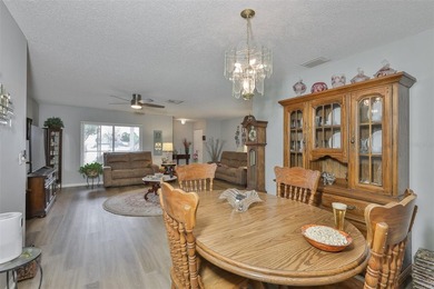 WELCOME TO THIS BEAUTIFULLY UPDATED TWINTREE residence on the on Caloosa Greens Executive Golf Course in Florida - for sale on GolfHomes.com, golf home, golf lot