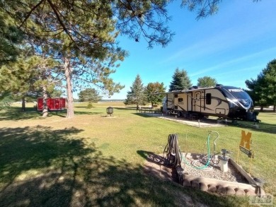 SUGAR SPRINGS! Get ready to enjoy this ultimate Up North getaway on Lakeside Golf Course in Michigan - for sale on GolfHomes.com, golf home, golf lot