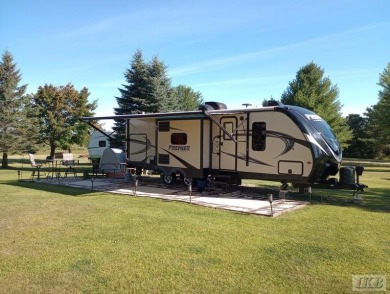 SUGAR SPRINGS! Get ready to enjoy this ultimate Up North getaway on Lakeside Golf Course in Michigan - for sale on GolfHomes.com, golf home, golf lot