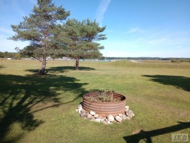 SUGAR SPRINGS! Get ready to enjoy this ultimate Up North getaway on Lakeside Golf Course in Michigan - for sale on GolfHomes.com, golf home, golf lot