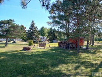 SUGAR SPRINGS! Get ready to enjoy this ultimate Up North getaway on Lakeside Golf Course in Michigan - for sale on GolfHomes.com, golf home, golf lot