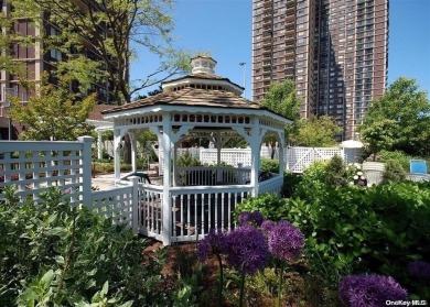 This spacious 1-2 bedroom apartment features a private balcony on Towers Country Club in New York - for sale on GolfHomes.com, golf home, golf lot