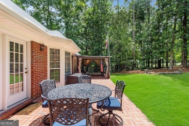 Discover this well-maintained, four-sided brick ranch perfectly on Fairfield Plantation Golf and Country Club in Georgia - for sale on GolfHomes.com, golf home, golf lot