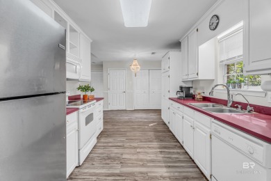 There's a rhythm to life in Lake Forest that locals know by on Lake Forest Yacht and Country Club in Alabama - for sale on GolfHomes.com, golf home, golf lot