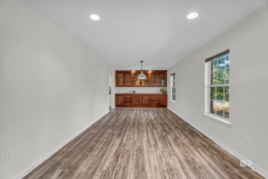 There's a rhythm to life in Lake Forest that locals know by on Lake Forest Yacht and Country Club in Alabama - for sale on GolfHomes.com, golf home, golf lot