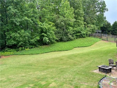 WELCOME HOME! TERRIFIC HOME ON THE CLUBHOUSE SIDE OF WOODMONT on Woodmont Golf and Country Club in Georgia - for sale on GolfHomes.com, golf home, golf lot