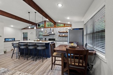 Discover your dream getaway at this idyllic lakehouse nestled in on Tanglewood Resort in Texas - for sale on GolfHomes.com, golf home, golf lot