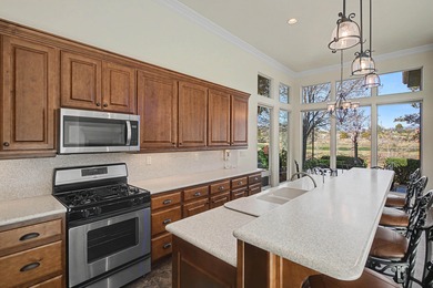 Set along the Sunbrook Golf Course, this elegant 3-bedroom on Sunbrook Golf Course in Utah - for sale on GolfHomes.com, golf home, golf lot