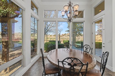 Set along the Sunbrook Golf Course, this elegant 3-bedroom on Sunbrook Golf Course in Utah - for sale on GolfHomes.com, golf home, golf lot