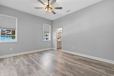 Welcome to a home that truly has it all--modern comfort on The Lakes Country Club in North Carolina - for sale on GolfHomes.com, golf home, golf lot